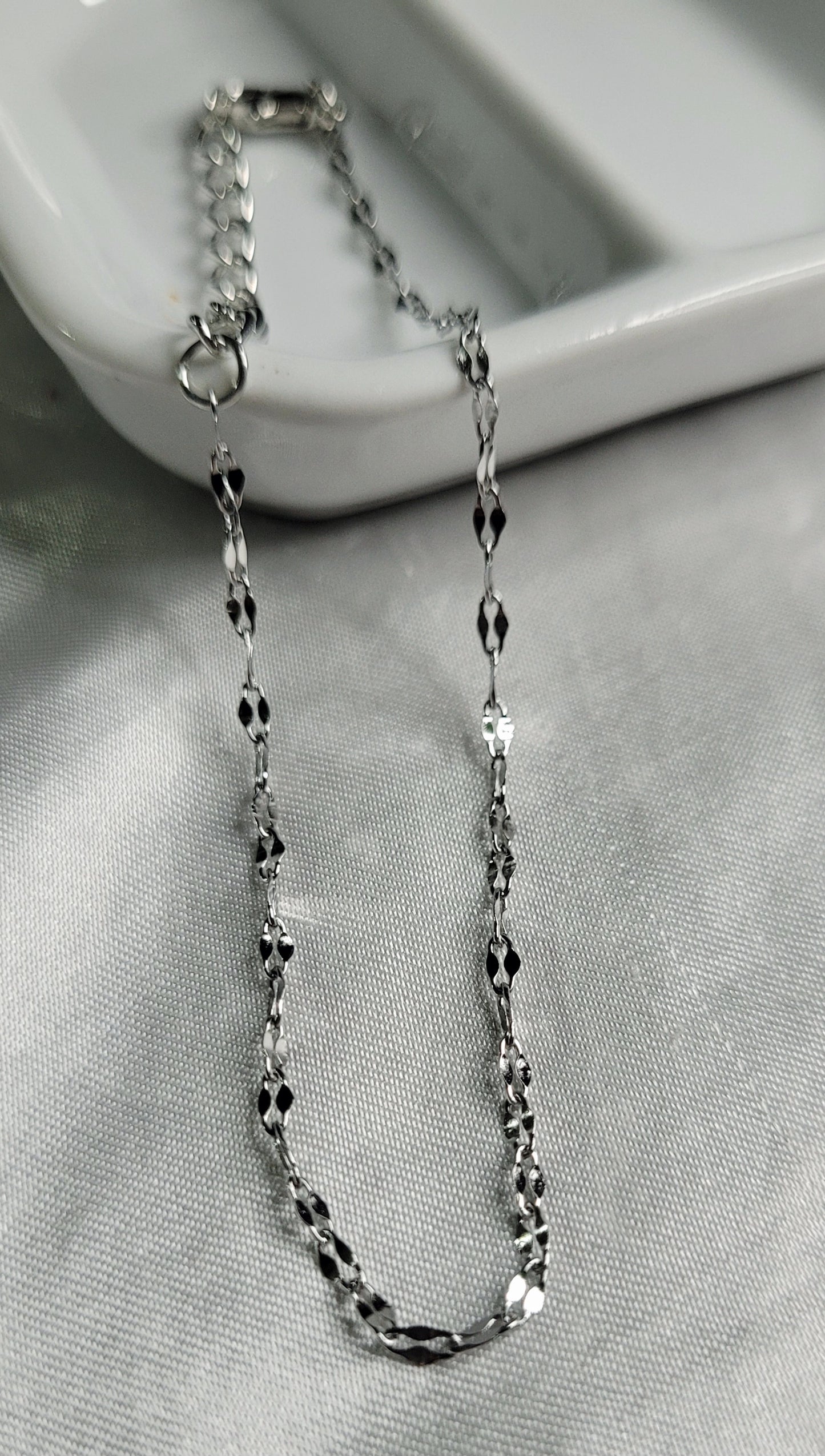 Pulseras plateadas