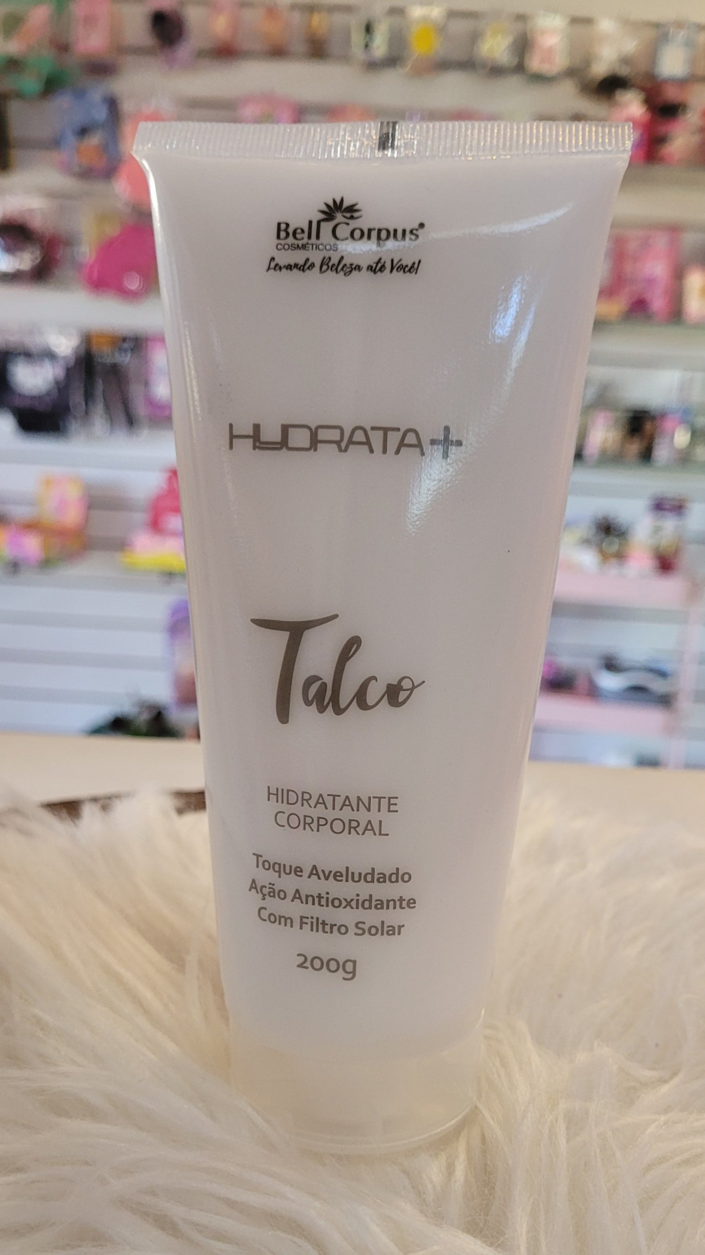 Crema hidratante corporal talco , con filtro solar