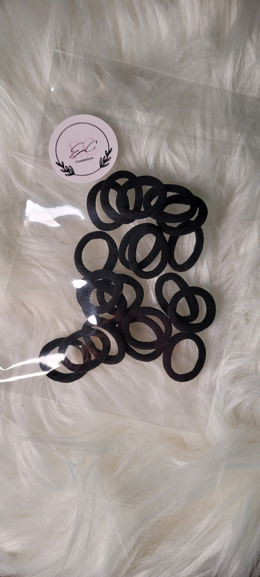 Bolsita con 20 colitas de pelo negras