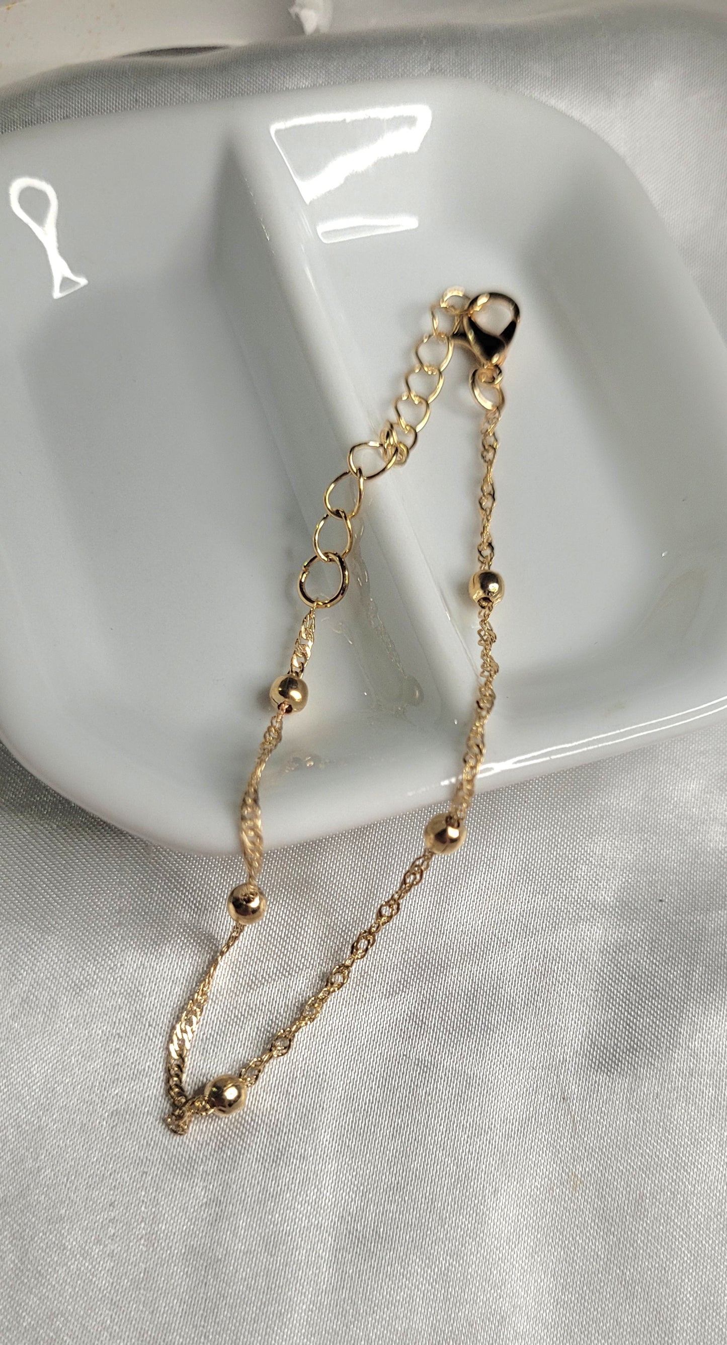 Pulseras doradas