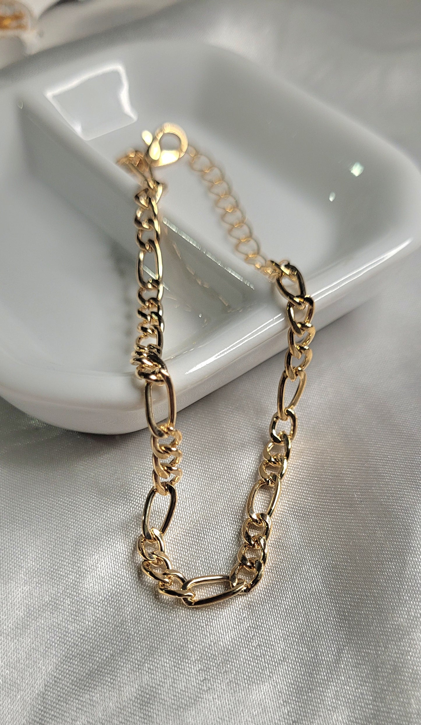 Pulseras doradas