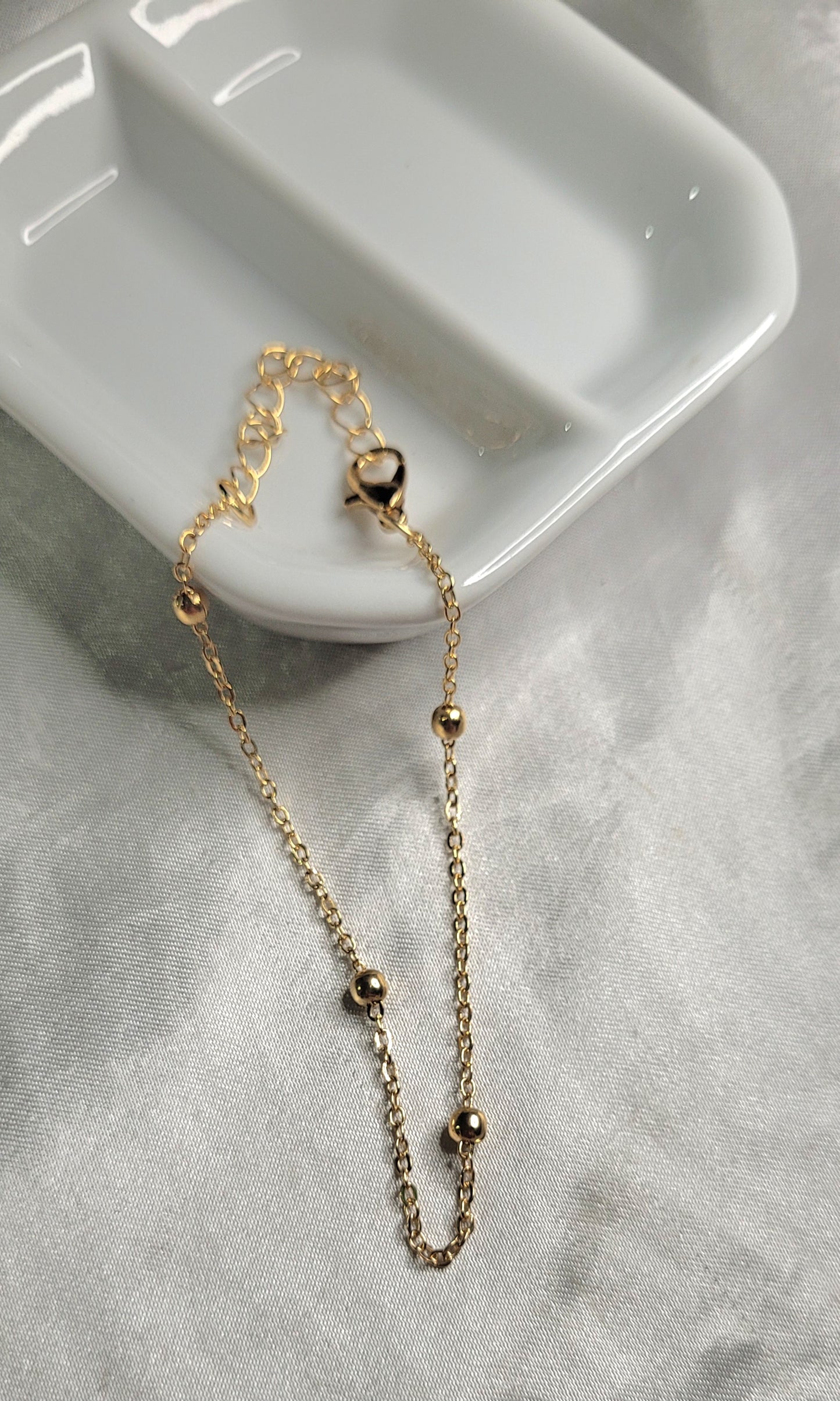 Pulseras doradas
